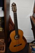 A vintage acoustic guitar.