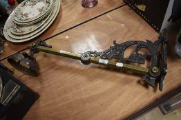 A Victorian wall light bracket, measuring 70cm long