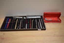 A collection of rollerball and ballpoint pens A/F