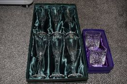 A box of six Thomas Webb crystal glass champagne flutes and two Edinburgh Crystal glass tumblers