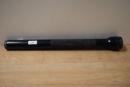 A very long Mag lite torch.