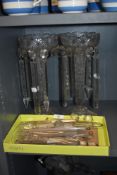 A pair of Victorian cut glass table lustres and drops, measuring 33cm tall