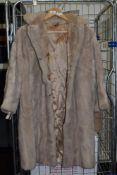 A vintage faux fur coat.