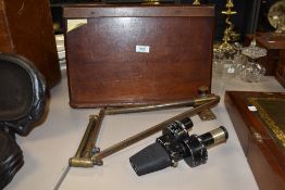 An interesting mahogany navigation table, of nautical interest, measuring 40cm wide, associated