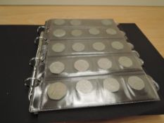 An album of GB Coins, early to modern, including Queen Victoria 1874 Half Crown, 1819 Crown, 1890