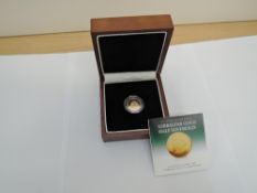 A London Mint 2012 Diamond Jubilee Gibraltar Gold Half Sovereign, in capsule with display box,