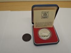 A 1789 Cronebaine Half Penny Token, Associated Irish Miners Arms along with a GB 1977 Silver Jubilee