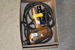 A vintage Black & Decker D700 electric drill.