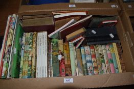 A carton of mainly childrens books including six Enid Blyton titles, a boxed set of The Wind in