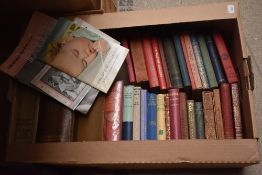 A carton of assorted books and novels including titles such as Mrs Beeton's Everyday Cookbook,