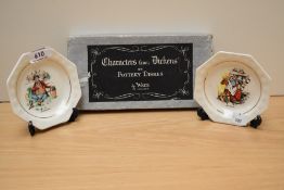 Two Wade pin dishes, with Charles Dickens depictions to centres.