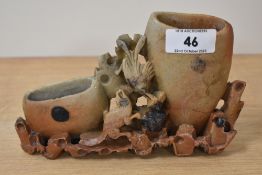 A Chinese carved soapstone bud vase.