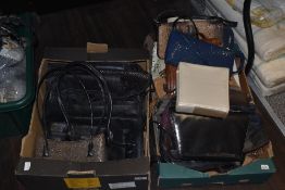 Two boxes of ladies modern and retro handbags, including leather.