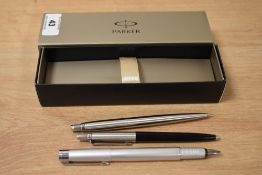A Parker Esprit fountain pen, a Parker propelling pencil and ballpoint pen