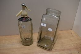 A vintage advertising jar 'For Size of Some, They Stand Alone, Sunripe Cigarettes' and a Scweppes
