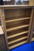 A modern golden oak bookcase
