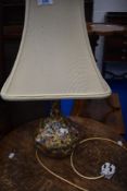 A Kashmir table lamp, labelled to base