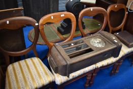 A set of four Victorian mahogany balloon back dining chairs