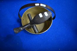 A traditional brass jam pan and cast cobblers last