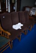 A set of eight oak framed upholstered dining chairs, with additional loose covers