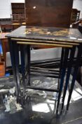 An Oriental laquerwork nest of three tables
