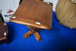 A vintage oak occasional low table having bulbous column