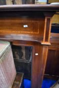 An Edwardian mahogany fire surround
