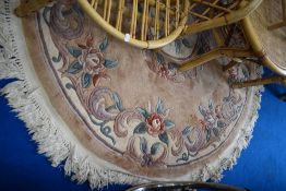 A chinese rug, of circular form having beige ground