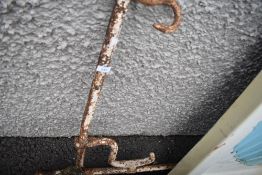 A metal sign bracket
