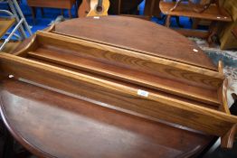 A mid stain Ercol wall shelf