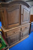 A traditional Danish linen or larder press cupboard with frieze drawers and cupboards to base, width