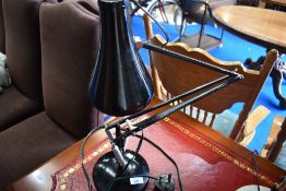 A vintage angle poise lamp