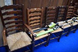 A set of six (four plus two ) traditonal rush seated ladderback chairs