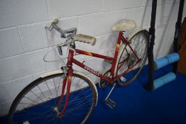 A vintage Peugeot Monte Carlo push bike.