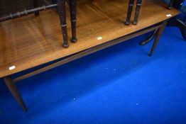 A vintage coffee table having teak top, approx 131 x 51cm