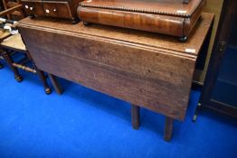 A 19th Century oak gateleg dining table