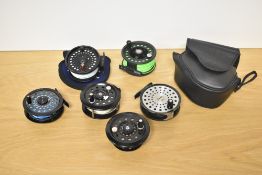 5 fly fishing reels by GEO lOGIC, Daiwa 230, Ron Thompson in original case, a Martin 65 and a