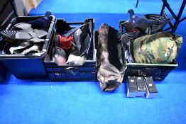 An electric pigeon decoy set up with batteries and a large guantity of decoys in 3 crates and a