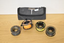 A Scierra fly reel with 3 spare spools in one original carry case