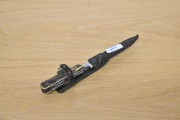 A PUMA WERK ORIGINAL WAIDMELLER HUNTING KNIFE, with 2 extra blades and corkscrew set in an antler