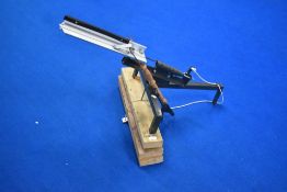 A clay pigeon trap and a hand held clay launcher