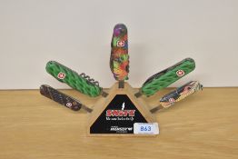 A Wenger shop Display block containing 5x swiss knives SNIFE