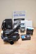 A Sony Video 8 handy cam in soft case with accessories