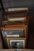 A carton of assorted picture and picture frames including some carved.