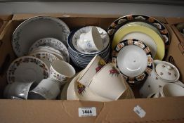 A selection of part dinner and tea services, a Coronation ware dessert set and an assortment of blue