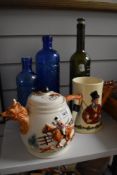 A Crown Devon 'John Peel' musical tankard and similar teapot AF, and three pressed glass bottles.