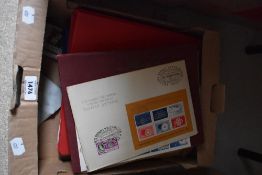 A collection of stamps, including first day covers, partially filled albums etc, including one empty