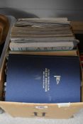 A box of maritime themed books and publications, including 'The Art of Nautical Illustration', '