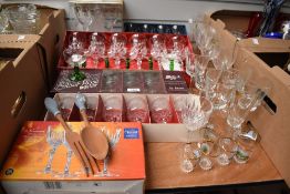 A collection of mainly boxed drinking glasses.