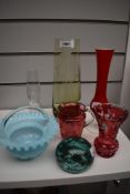 A selection of vintage art glass, including cranberry glass jug with enamel detail, vaseline glass